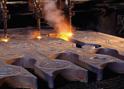 A man is doing the metallurgy.