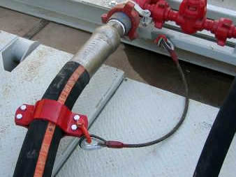 A motion compensator hose is installed on the drilling rig.