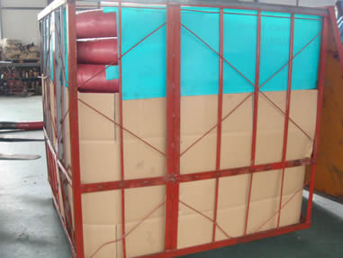 Several rolls of rotary drilling hoses are packaged into a large box.