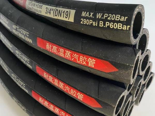 Many fiber braided steam hoses are displayed.